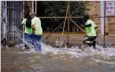  ?? MARSHALL GORBY / STAFF ?? A water main break in Dayton at Keowee Street and Monument Avenue on Aug. 3 affffected businesses in the area.