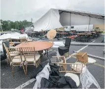  ?? PETER McCABE ?? Three people were injured after the storm ripped apart a large tent set up for this year’s Strangers in the Night gala in Pointe-Claire.