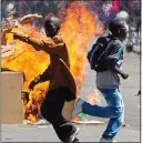  ??  ?? civiL StRiFE: Zimbabwe’s unrest said to be on a par with risks in UK