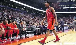  ?? FRANK GUNN / THE CANADIAN PRESS FILES ?? Toronto Raptors guard Kyle Lowry walks off the court after being ejected Sunday at home against Washington.