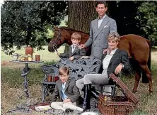  ??  ?? The 1992 Lord Snowdon portrait of Diana, Charles and their two sons on a casual family picnic.