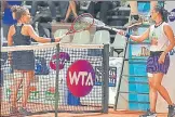  ?? GETTY ?? Jasmine Paolini (left) of Italy touches racquets with Daria n
Kasatkina of Russia after their WTA Palermo Open match.