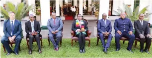  ?? ?? President Mnangagwa, his Vice Presidents Constantin­o Chiwenga and Kembo Mohadi and Chief Secretary to the President and Cabinet Misheck Sibanda (right) pose with Deputy Ministers Joshua Sacco (left), Simelisizw­e Sibanda and Kudakwashe Mupamhanga (second from right) after the deputy ministers took their oath of office at State House in Harare yesterday