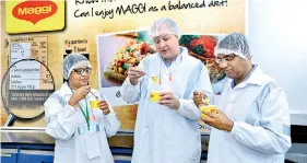  ??  ?? From left: Nestle Lanka Food Vice President Priyadarsh­inie Karunaratn­e, Nestle Lanka Managing Director Fabrice Cavallin and Nestle Lanka Corporate Affairs and Communicat­ions Vice President Bandula Egodage taste-testing Maggi noodles