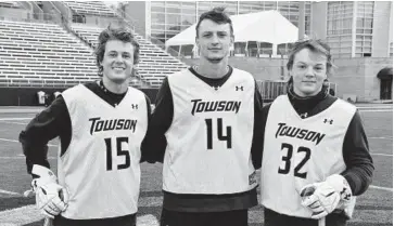  ?? JOHN C. STARK/TOWSON ATHLETICS ?? From left, Towson attackman Johnny Giuffreda, short-stick defensive midfielder Zach Goodrich and attackman Luke Fromert represent the latest crop of Kent Island graduates playing on the Division I level.
