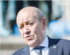  ?? (Jens Schlueter/Pool via Reuters) ?? FRENCH FOREIGN MINISTER Jean-Yves Le Drian calls nuclear sub deal ‘stab in the back... unacceptab­le behavior between allies and partners.’
