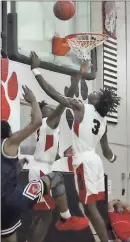  ??  ?? Tyler Williams /
SJ Cedartown players go up for a rebound during their Friday game against Paulding County at home.