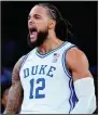  ?? (AP/Frank Franklin II) ?? Duke’s Theo John celebrates during the second half of the ninth-ranked Blue Devils’ 79-71 victory over No. 10 Kentucky on Tuesday night in New York.
