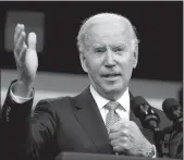  ?? Yuri Gripas
/ Abaca Press /TNS ?? U.S. President Joe Biden replies to questions from the media after discussing inflation and lower costs for working families in the South Court Auditorium at the White House in Washington, D.C., ontuesday.