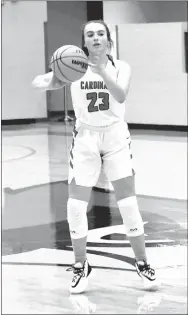  ?? MARK HUMPHREY ENTERPRISE-LEADER ?? Farmington junior Trinity Johnson passes the ball. Johnson scored 16 points as the Lady Cardinals won at Alma, 63-48, on Tuesday, Dec. 10.