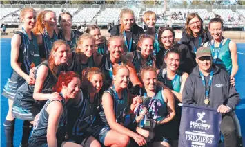  ??  ?? Hockey Geelong's women's team after the Vic League 1 grand final win at the State Hockey Centre.
