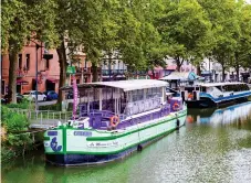  ??  ?? HOMAGE TO VIOLETS: La Maison de la Violette barge sells everything from soaps to jams