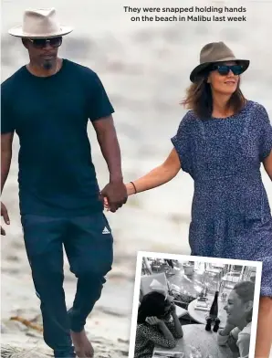  ??  ?? They were snapped holding hands on the beach in Malibu last week