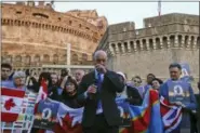  ?? GREGORIO BORGIA — THE ASSOCIATED PRESS FILE ?? Sex abuse survivor Peter Isely, of the U.S. founded Ending Clergy Abuse organizati­on, speaks during a twilight vigil prayer near Castle Sant’ Angelo, in Rome.