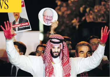  ?? LEFTERIS PITARAKIS / THE ASSOCIATED PRESS ?? An activist wearing a mask of Saudi Crown Prince Mohammed bin Salman holds up his blood-red hands at a vigil for Saudi journalist Jamal Khashoggi outside Saudi Arabia’s consulate in Istanbul in October.