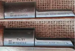  ??  ?? ABOVE: The original Oberndorf Mauser African rifles with Handguard. LEFT: The consecutiv­e serial numbers on the 9x57mm African twins.