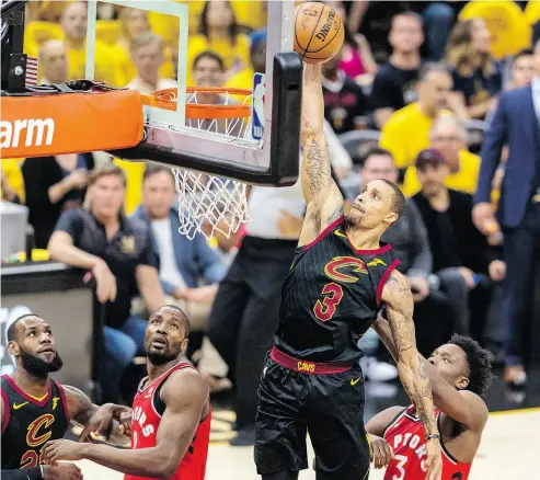  ?? JASON MILLER/ GETTY IMAGES ?? George Hill of the Cleveland Cavaliers dunks over the Toronto Raptors defence during the first half of Game 4 of their second-round series at Quicken Loans Arena Monday in Cleveland.