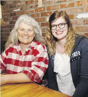  ??  ?? Maryann Borch of Good Note Community Farm poses with Sina Tietz.