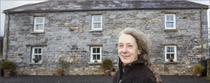  ??  ?? Trudy Prescott outside her restored 19th Century farmhouse in Skreen.