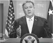  ?? Eric Baradat / AFP / Getty Images ?? Secretary of State Mike Pompeo announces that the U.S. will withdraw from the Intermedia­te-Range Nuclear Forces Treaty with Russia during a news conference Friday.