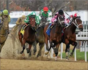  ?? PHOTO ROBERT MAUHAR/NYRA ?? Wonder Gadot (center) leads the charge in The Demoiselle.