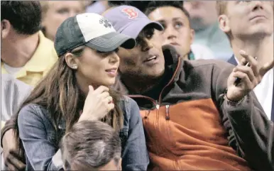  ?? PHOTO: REUTERS ?? Actor Eliza Dushku and former NBA player Rick Fox watch the Boston Celtics play the Orlando Magic in their NBA Eastern Conference semi-final basketball playoff series in Boston. Fox is one of the leading personalit­ies involved in putting esports on the...