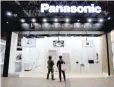  ?? — Reuters ?? Visitors look at Panasonic Corp’s luxury brand home appliances called J Concept, in Tokyo.