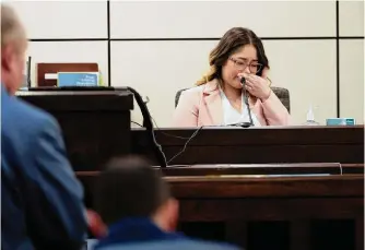  ?? Jessica Phelps/staff photograph­er ?? Jackie Mccraken, wife of defendant Roger Lee-canada Mccracken, gets emotional Tuesday while testifying at his murder trial. She said victim Ronnie Riddle had been “agressive and angry.”