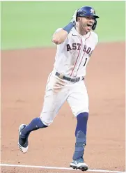  ?? AFP ?? Carlos Correa reacts during a game with the Houston Astros in 2020.