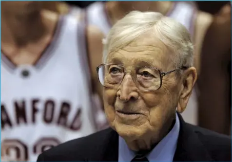  ?? Tribune News Service ?? John Wooden, shown in 2014, is best known for his time at UCLA. But Wooden was born in Indiana, played at Purdue, and coached at South Bend Central HS and Indiana State. Other Indiana coaching legends include Bobby Knight (Indiana), Gene Keady (Purdue), and Tony Hinkle (Butler).