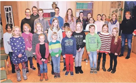  ?? FOTO: MICHAEL SIEBER ?? Immer freitags kommen die Mitglieder des Kinder- und Jugendchor­es „Voices“zur Probe in den Gemeindesa­al der Citykirche.