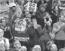  ?? NHATV. MEYER/STAFF ?? Gonzaga fans celebrate at SAP Center as the Bulldogs beatWest Virginia to advance.