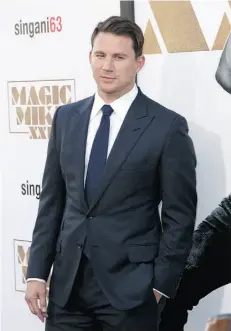  ?? A. HEBERT/INVISION/THE ASSOCIATED PRESS/FILE ?? Channing Tatum arrives at the Los Angeles premiere of Magic Mike XXL, which opens in theatres on Canada Day.