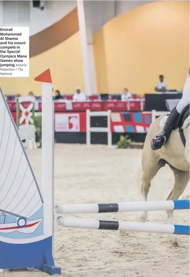  ?? Antonie Robertson / The National ?? Emirati Mohammed Al Shamsi and his mount compete in the Special Oympics Mena Games show jumping