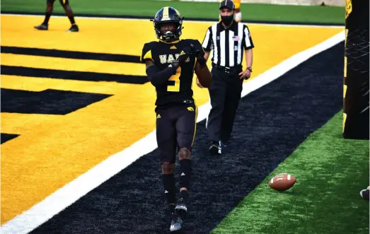  ?? (Pine Bluff Commercial/I.C. Murrell) ?? UAPB wide receiver Josh Wilkes dances after scoring a touchdown on a 5-yard reception against Prairie View A&M on Saturday at Simmons Bank Field.
