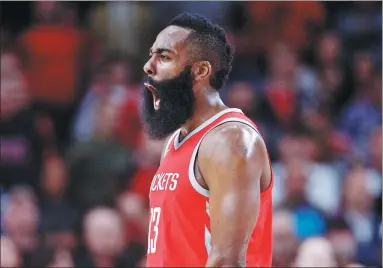  ?? CRAIG MITCHELLDY­ER / USA TODAY SPORTS ?? Houston Rockets’ James Harden reacts after Tuesday’s 115-111 triumph over the Portland Trail Blazers at Moda Center in Portland. Harden scored 42 points as the Rockets snapped the Blazers’ 13-game winning streak.