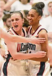  ?? Tyler Sizemore/Hearst Connecticu­t Media ?? UConn's Nika Mühl, left, and Aubrey Griffin.