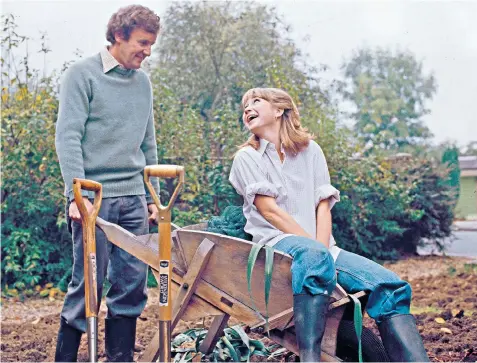  ??  ?? Get your hands dirty: now we all want to live The Good Life like Tom and Barbara; supermarke­ts are going back to the old way of selling their spuds, right