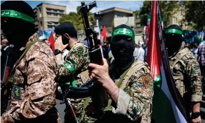  ?? Photograph: Sobhan Farajvan/Pacific Press/REX/Shuttersto­ck ?? A member of the Islamic Revolution Guard Corps during a rally in Tehran, Iran. Israel may push for Australia to designate the group a terrorist organisati­on.