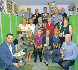  ??  ?? Dunaverty trophy winners proudly show off their silverware.