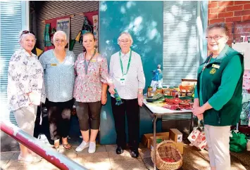  ?? ?? Drouin CWA Volunteers, from left, Margaret Owen, Lorraine Knight, Toby Mitchell, Joan Laby and Gwen Dale were among the members kept busy at their stall in Princes Way o n Monday. The monthly stall has returned on the first Thursday of each month.