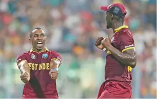  ?? AP file ?? West Indian Dwayne Bravo (left) is excited to be part of the first T10 tournament. —