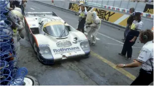  ??  ?? Below 956 no.3, driven by Vern Schuppan, Hurley Haywood and Al Holbert, entering the pits en route to victory at Le Mans in 1983