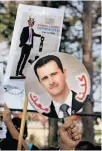  ?? Eraldo Peres / Associated Press ?? Demonstrat­ors support Bashar Assad and denounce President Obama on Friday.