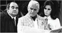  ??  ?? LEFT: Ed Asner (from left), Ted Knight and Mary Tyler Moore appear in a 1971 episode of “The Mary Tyler Moore Show.”