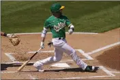  ?? MATT YORK — THE ASSOCIATED PRESS ?? Jed Lowrie is back with the A's after hitting 14homers with 69RBIs across 139games for the club last season.