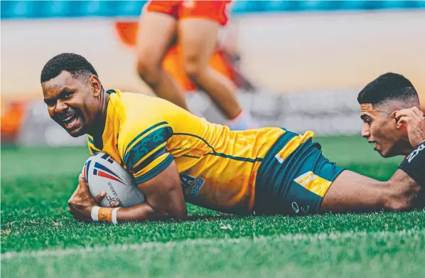  ?? ?? David Tabuai scores a try for ADF in the Gallipoli Cup against Turkey at the SCG. Picture: Kriss Saad