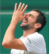  ?? TIM IRELAND / AP ?? Marin Cilic reacts after losing a point to Roger Federer in Sunday’s Wimbledon final.