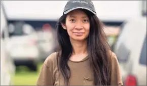  ?? Richard Shotwell / Associated Press ?? Film director Chloe Zhao attends the Telluride-from-Los Angeles drive-in screening of her movie “Nomadland.”