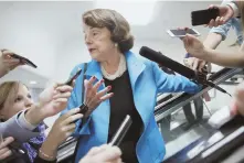  ?? AP Photo ?? KEY ROLE: Sen. Dianne Feinstein is asked questions by reporters as she arrives on Capitol Hill.